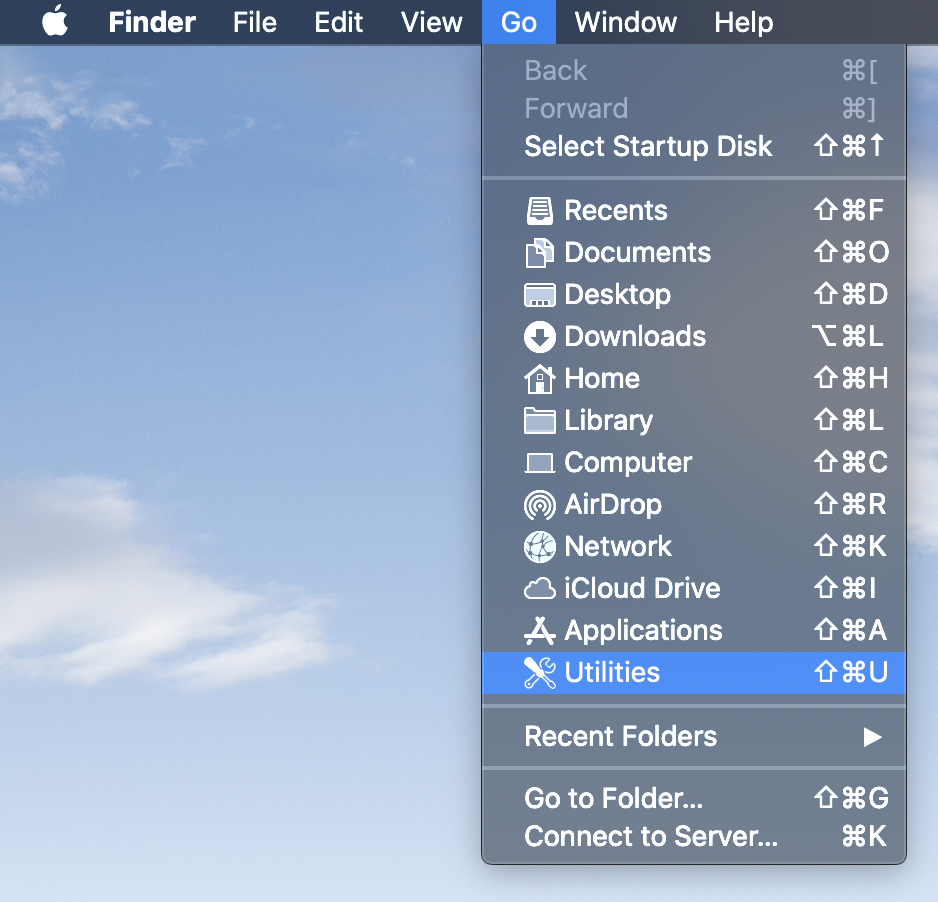 macOS Finder "Go" dropdown menu with the "Utilities" option highlighted.